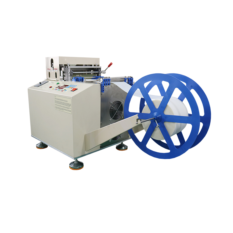 Adhesive backed velcro tape cutting machine
