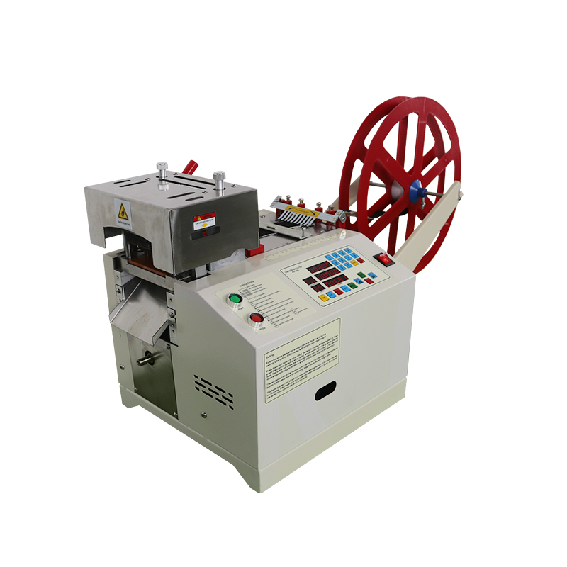 Adhesive backed velcro tape cutting machine